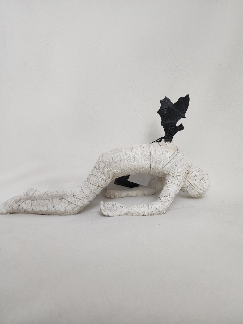 HALLOWEEN White Wrapped MUMMY BEING CARRIED OFF BY A VAMPIRE BAT